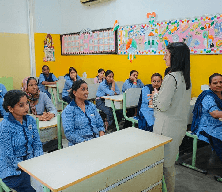 Senior faculty conducting a workshop for support staff and DAs