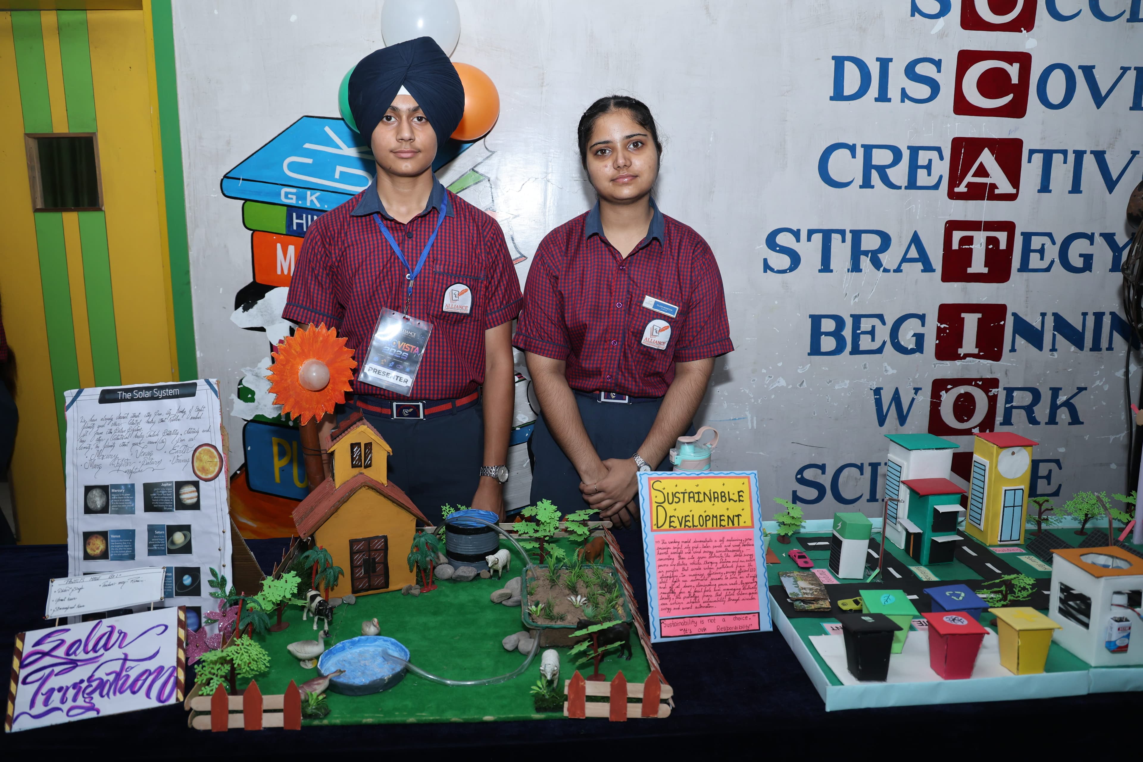 AIS students presenting a sustainable development project model